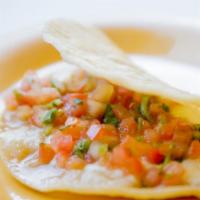 Regular Corn Quesadilla · Cheese and fresh salsa.