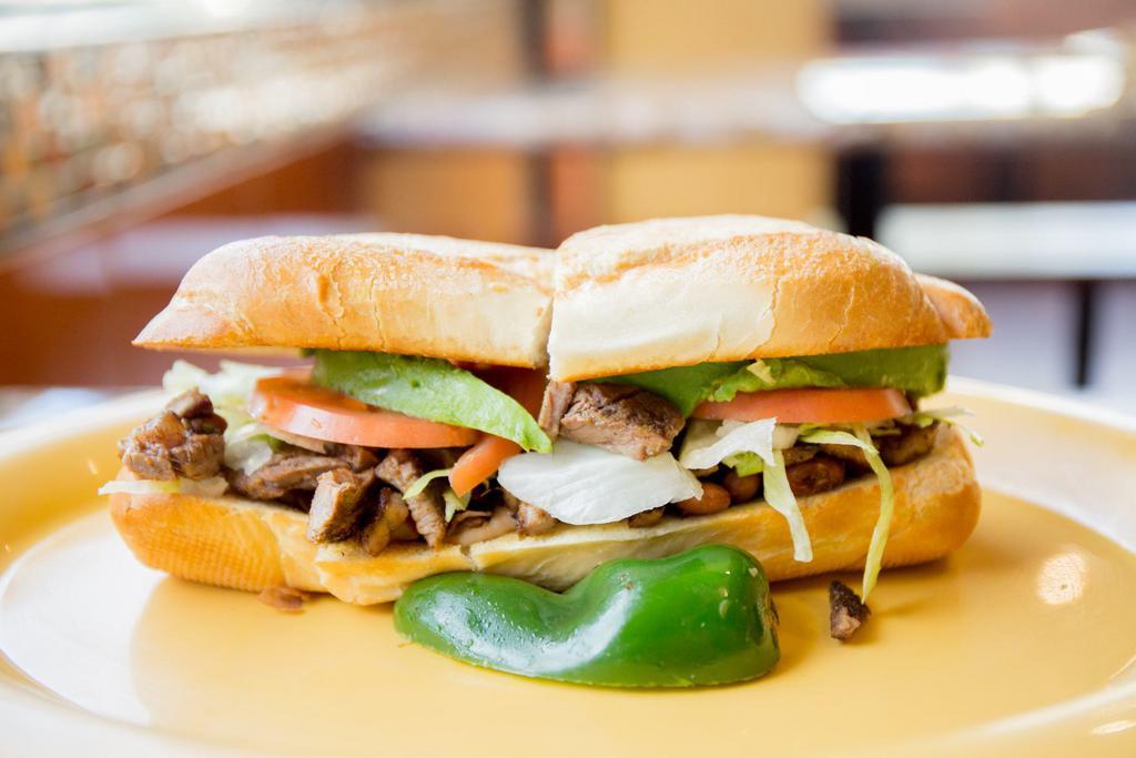 Torta · French roll with mayo, beans, lettuce, tomato, avocado, and your choice of meat.