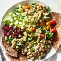 Zaatar Smashed Chickpea Salad · Delicious smashed chickpeas tossed with fresh avocado, cucumbers, red onions, cilantro and l...