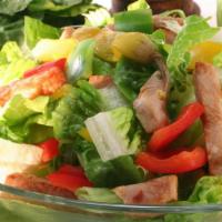 Turkey Salad · Small turkey salad with mixed greens and fresh tomatoes.