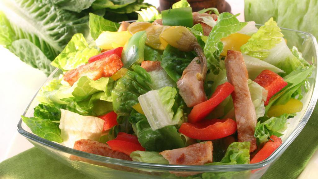 Turkey Salad · Small turkey salad with mixed greens and fresh tomatoes.