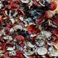 The Ultimate · mozz, toma, organic sauce, mixed mushrooms, pepperoni, truffle zest