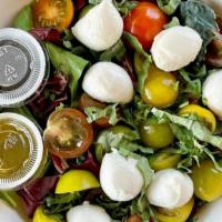 Caprese Salad · greens, cherry tomato, basil, belfiore fresh mozz, evoo, balsamic glaze