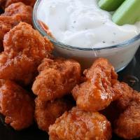 10 Pc Boneless Wings Combo (Not Halal) · tossed in wing sauce. Includes fries & 1 can soda