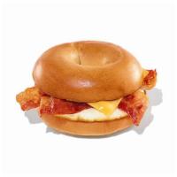 Bacon Egg And Cheese · Go the extra mile by bringing bacon to your Dunkin' Breakfast Sandwich. Bacon with egg and c...