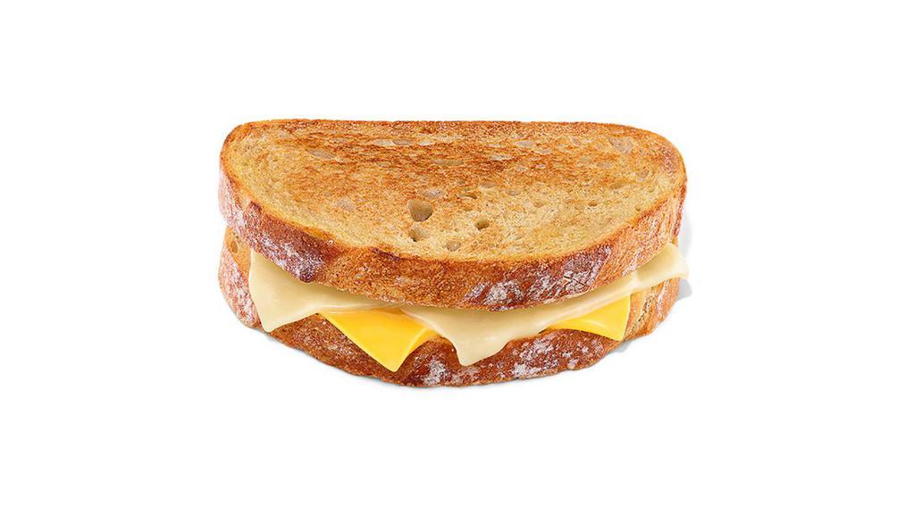 Grilled Cheese Melt · Toasted Sourdough bread with white cheddar and American cheese.
