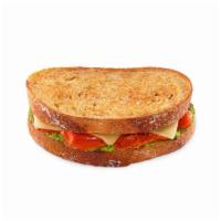 Tomato Pesto Grilled Cheese · Roasted tomatoes, pesto spread and melted white cheddar cheese between two pieces of toasted...