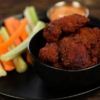 Boneless Nashville Hot Wings · 8 piece Nashville hot wings - medium heat. Come with 8  classic style bone-in wings, carrots...