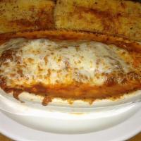 Lasagna · Grandma's favorite. Served with garlic bread