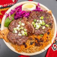 Chaplee Kabob · Grilled sirloin patties mixed with green onions, crushed chili peppers and house seasonings.