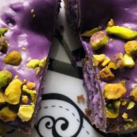 Ube Donut with Ube Icing Top with Pistachio · 