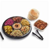 Mediterranean Platter (Feeds 6 People) · Create your own Mediterranean platter!

Choose your protein: Falafel, All Natural Chicken Sh...