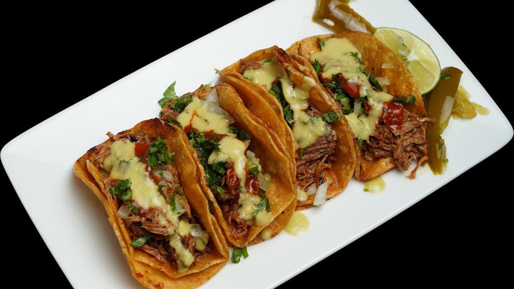 Tacos  · Choice meat, onions cilantro, salsa