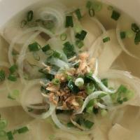 22. Phở Bò Viên (Chicken Soup) · Rice noodles soup with meatballs.