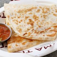 Quesadillas · Includes a flour tortilla, cheese and choice of meat or veggies.