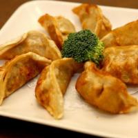 Pot Sticker (6) · What makes  ANNIE'S POTSTICKERS IRRESISITABLE!?
It is Homemade Pot Sticker! Homemade with po...