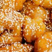 Sesame Chicken · Diced chicken breaded and deep fried with sesame seeds and sauteed with sauce.