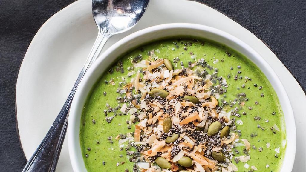 Green Detox Smoothie Bowl · Pineapple, spinach, parsley, coconut milk, almond butter, lemon juice, chia seeds topped with toasted coconut, pumpkin seeds, sunflower seeds and bee pollen