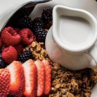 Jane's Vegan and Gluten-free Granola · Berries with rice, almond or soy milk.