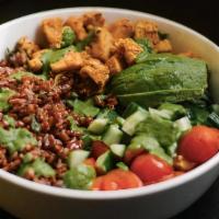 Peruvian Chicken Rice Bowl · red rice, spiced chicken breast, cucumber, avocado, romaine, cherry tomato, herb dressing