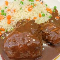 Chicken mole · Leg quarter chicken with delicius
Mole sauce served with rice and 
Home  made tortillas