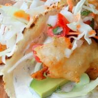 Baja Tacos · Breaded cod fish or shrimp, lettuce, tomatoes, and mild chipotle mayonnaise sauce.
