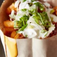 LOADED FRIES · Applewood smoked bacon, sour cream, green onions, melted cheddar cheese