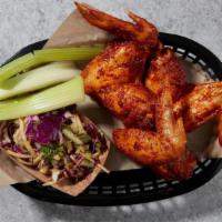 THREE WINGS · Not your average party wings - we serve 'em whole! Get it classic or spicy. With celery stic...