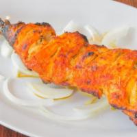 4. Chicken Leg Tandoori · Chicken leg delicately seasoned in rare spices & yogurt baked in the tandoor to enhance it s...