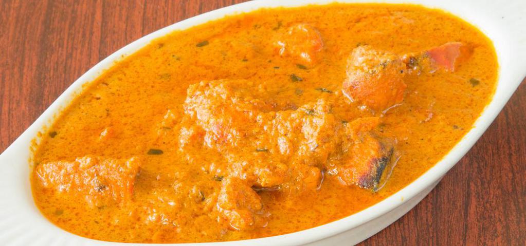 13. Chicken Tikka Masala · A typical North Indian home-style boneless breast meat in a mild creamy sauce blended w/ selected herbs & spices.