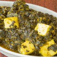 21. Palak Paneer · Mildly spiced paneer cubes cooked in creamy spinach.