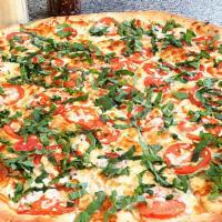 Gluten Free Margherita Pizza · Eight slices. Cheese, basil, tomatoes, and garlic.