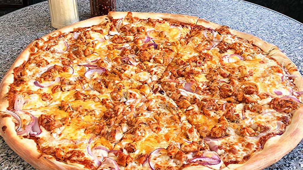 West Side Bar B Que Chicken Pizza · Eight slices. Smokey BBQ sauce pizza with red onions and BBQ chicken topped with Cheddar cheese.