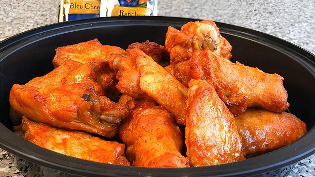 12 Pieces Hot Wings · Comes with ranch or blue cheese dip.