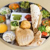 Rajwadi Gold Thali · Fixed meal of 3 Veg. Curries of the day (Gujarati Surti Undhiyu Curry, Veg. Paneer Curry of ...