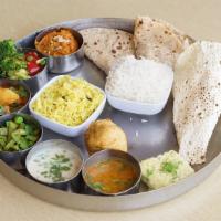 Rajwadi Silver Thali · Fixed meal of 3 Vegetable Curries of the day + Gujarati Surti Dal + Gujarati Surti Kadhi + R...