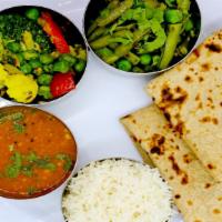 Rajwadi Vegan Thali (No dairy) · Fixed meal of 2 Vegan Curries of the day + Gujarati Surti Dal + Rice + Roti (3 pcs.).