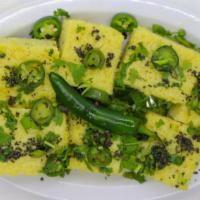 Khaman Dhokla (6-8 pcs.) · Khaman, is a popular Gujarati snack, made from Ground Gram Flour or Besan. Dhokla, is made w...