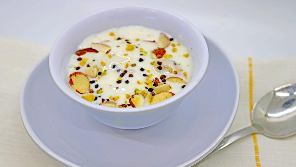 Srikhand · Chef's Speciality - Velvety sweetened yogurt made with Raisin, Almond, Pistachio and Cardamom.