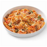 Penne Rosa With Parmesan-Crusted Chicken · Penne noodles in spicy tomato cream sauce, parmesan-crusted chicken, mushrooms, tomato and s...