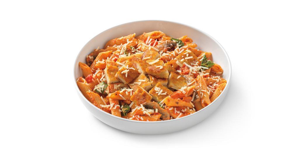 Penne Rosa With Parmesan-Crusted Chicken · Penne noodles in spicy tomato cream sauce, parmesan-crusted chicken, mushrooms, tomato and spinach topped with your choice of parmesan or feta. . S .