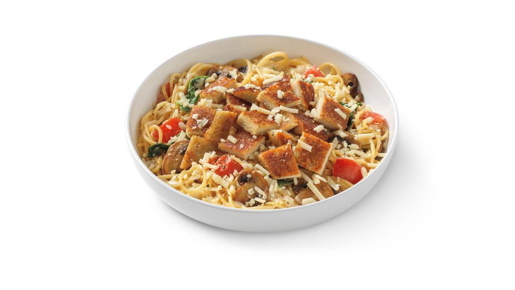 Alfredo Montamore® With Parmesan-Crusted Chicken · Spaghetti noodles in four-cheese blend alfredo, roasted mushrooms, tomato, spinach and parmesan-crusted chicken topped with MontAmore cheese and cracked pepper.