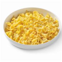 Buttered Noodles · Tender wavy egg noodles and butter topped with  Italian seasonings and parmesan. Try with ov...