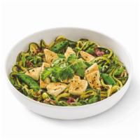 Zucchini Grilled Orange Chicken · Zucchini noodles sautéed in orange sauce with snap peas, napa and red cabbage topped with gr...