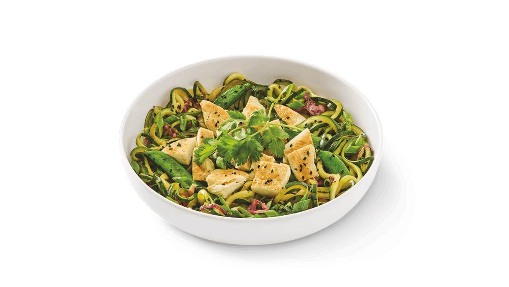 Zucchini Grilled Orange Chicken · Zucchini noodles sautéed in orange sauce with snap peas, napa and red cabbage topped with grilled chicken, green onions, black sesame seeds and cilantro.