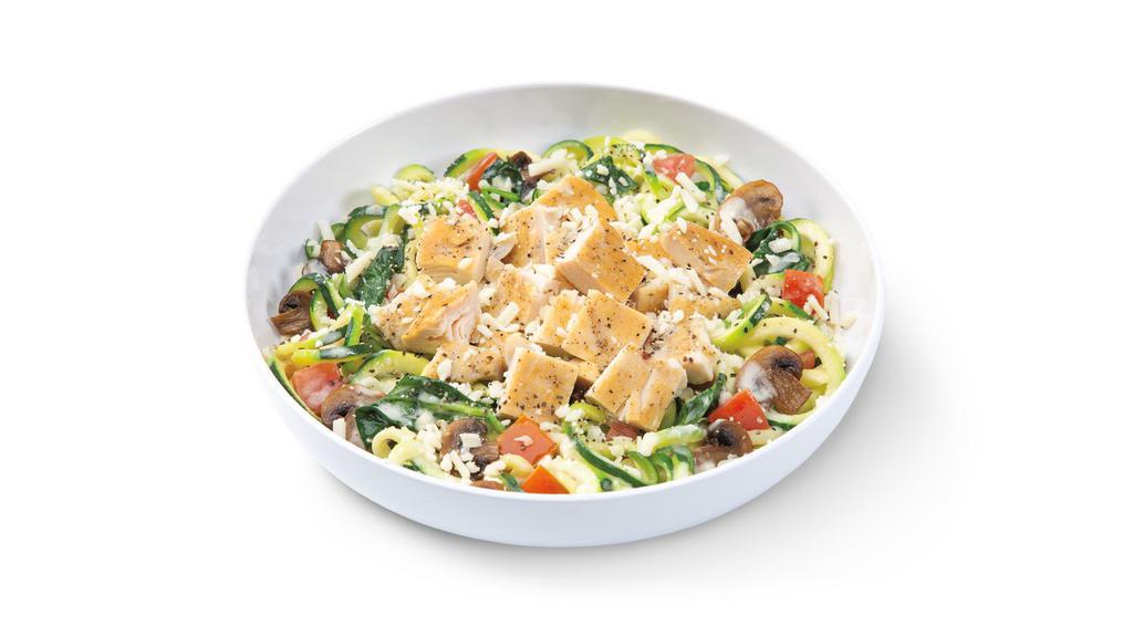 Zucchini Alfredo Montamore® With Grilled Chicken · Crafted for Keto with zucchini noodles, four-cheese blend alfredo, roasted mushrooms, tomato, spinach and grilled chicken, topped with MontAmoré cheese and cracked pepper.