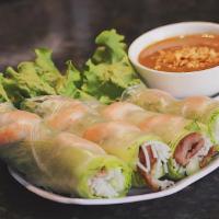 Spring Rolls · come with 4 rolls, 
shrimps, grilled pork, cucumber, lettuce, wrapped with fresh rice paper....
