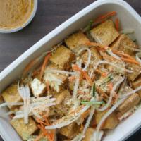 Tofu Salad with Peanut Sauce · Fried firm tofu. Garnished with bean sprouts, sliced cucumbers and jicama, dressed in a swee...