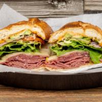 Ami-Cado · Lean Pastrami, Salami, Avocado, Pepper Jack Cheese, Lou's Special Sauce, on a Soft & Sweet R...