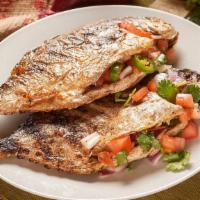 Pompano (each) · Pampano is marinated with citrus and dusted with spices, then grilled just right. Stuffed wi...